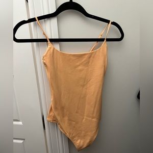 Orange tight bodysuit